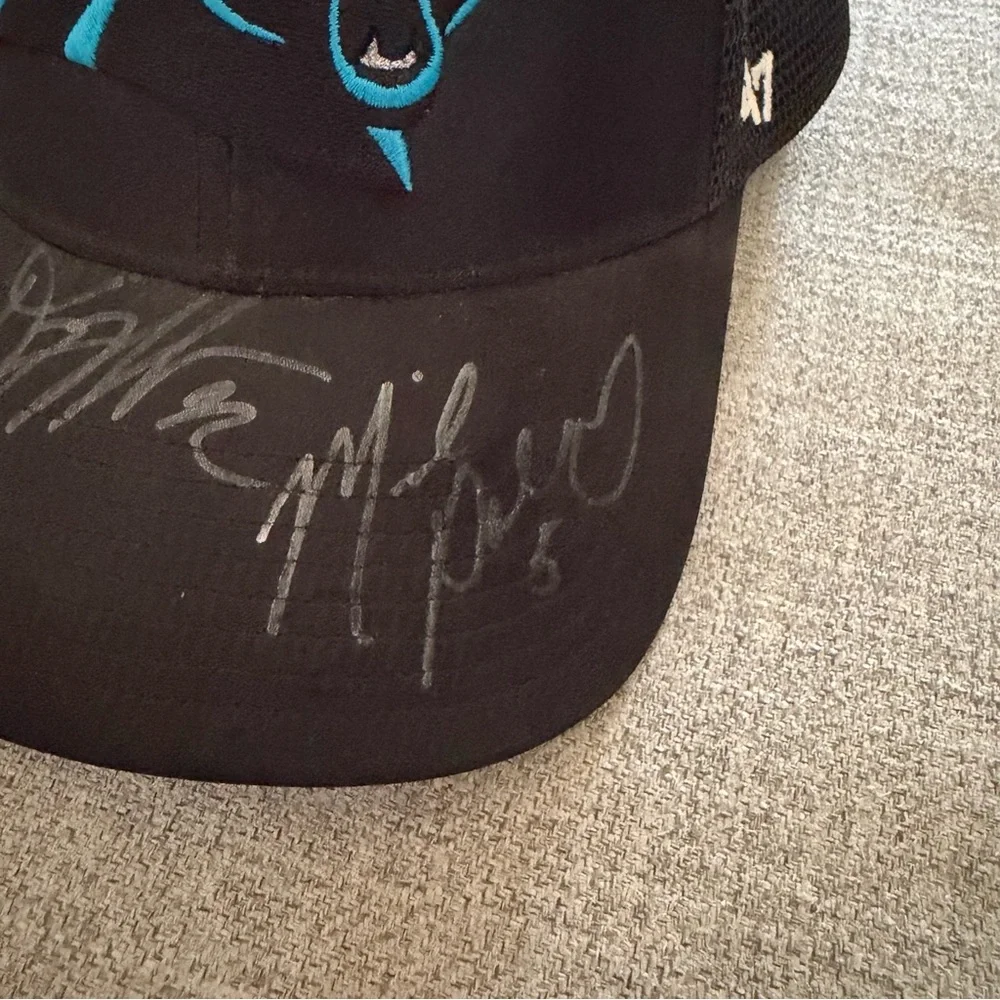 North Carolina NC Panthers Black Trucker Hat with Teal Logo 47 signed autograph